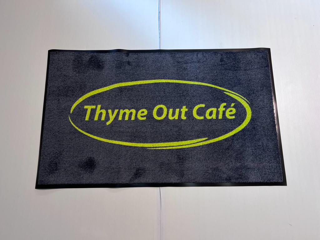 outdoor/indoor mat with branding