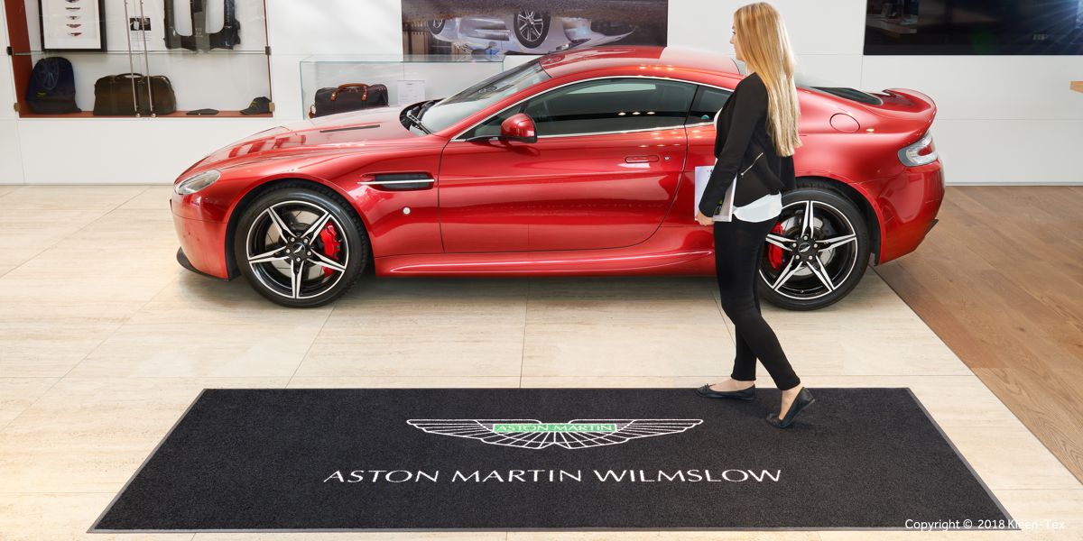  Large-sized welcome mat with branding 